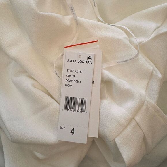 Julia Jordan
Knot Halter Neck Sleeveless Faux Wrap Tulip Hem Midi Dress IVORY - Picture 4 of 7